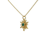 Collier doré soleil rayons irréguliers et onyx verte 42 cm