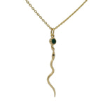 Gold necklace with snake and stone pendant