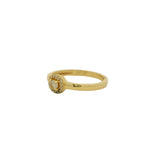 Bague dorée petit solitaire rond pierre et zircons
