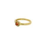 Bague dorée petit solitaire rond pierre et zircons