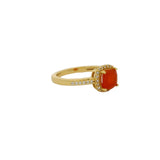 Golden solitaire ring with zircons and square stone