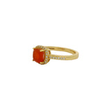Golden solitaire ring with zircons and square stone
