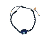 Bracelet doré cordon bleu marine avec oeil verre soufflé