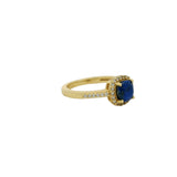 Golden solitaire ring with zircons and square stone