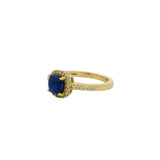 Golden solitaire ring with zircons and square stone