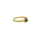 Bague dorée petit solitaire rond pierre et zircons