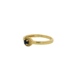Bague dorée petit solitaire rond pierre et zircons