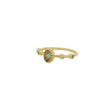 Bague dorée pierre ovale et zircons