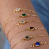 Bracelet doré grenat ovale