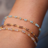 Bracelet doré petites pierres facettées en quartz fumé