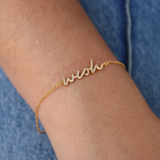 Bracelet doré message "wish" en zircons blancs