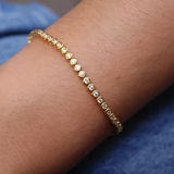 Bracelet tennis doré et zircons blancs sertis clos 2 mm