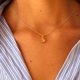 Gold broken heart and stone necklace
