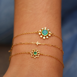 Bracelet doré fleur en onyx verte et zircons blancs