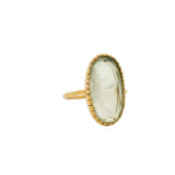 Bague dorée et pierre naturelle ovale