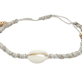 Bracelet doré cordon beige avec cauri naturel