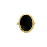 Bague dorée et pierre plate ovale