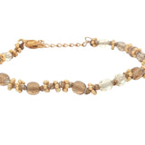 Bracelet doré perles fantaisie avec couronnes dorées