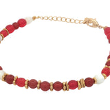 Bracelet doré avec onyx rouge, nacre, couronnes et disques dorés