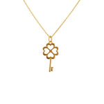 Collier doré clé trêfle coeurs