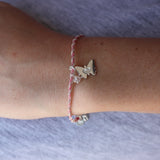 Bracelet cordon rose - Pendentif papillon