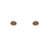 Boucles dorées et pierre ovale