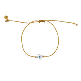 Bracelet tressé doré et croix avec oeil