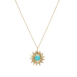 Collier doré pendentif soleil et pierre