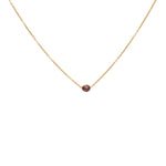 Collier doré et perle de culture grise
