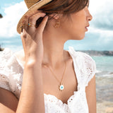 Sautoir doré oeil nacre et zircons