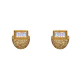 Boucles dorées martelées et pierre