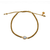 Bracelet tressé doré et pierre