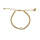 Bracelet tressé doré et pierre
