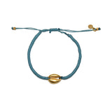 Bracelet cordon gris bleu et cauri doré