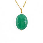 Collier doré grand scarabée pierre