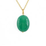 Collier doré grand scarabée pierre