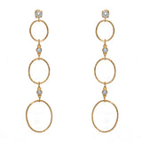 Boucles dorées anneaux martelés et pierre
