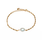Bracelet de cheville doré et perle de culture