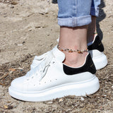 Chaine de cheville dorée et pierres