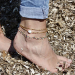 Bracelet de cheville doré et perle de culture