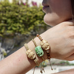 Bracelet tressé doré et scarabée