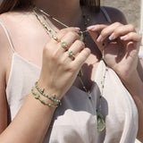 Bracelet cordon avec pierres et pampilles en pierre