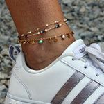 Chaine de cheville dorée et pierres