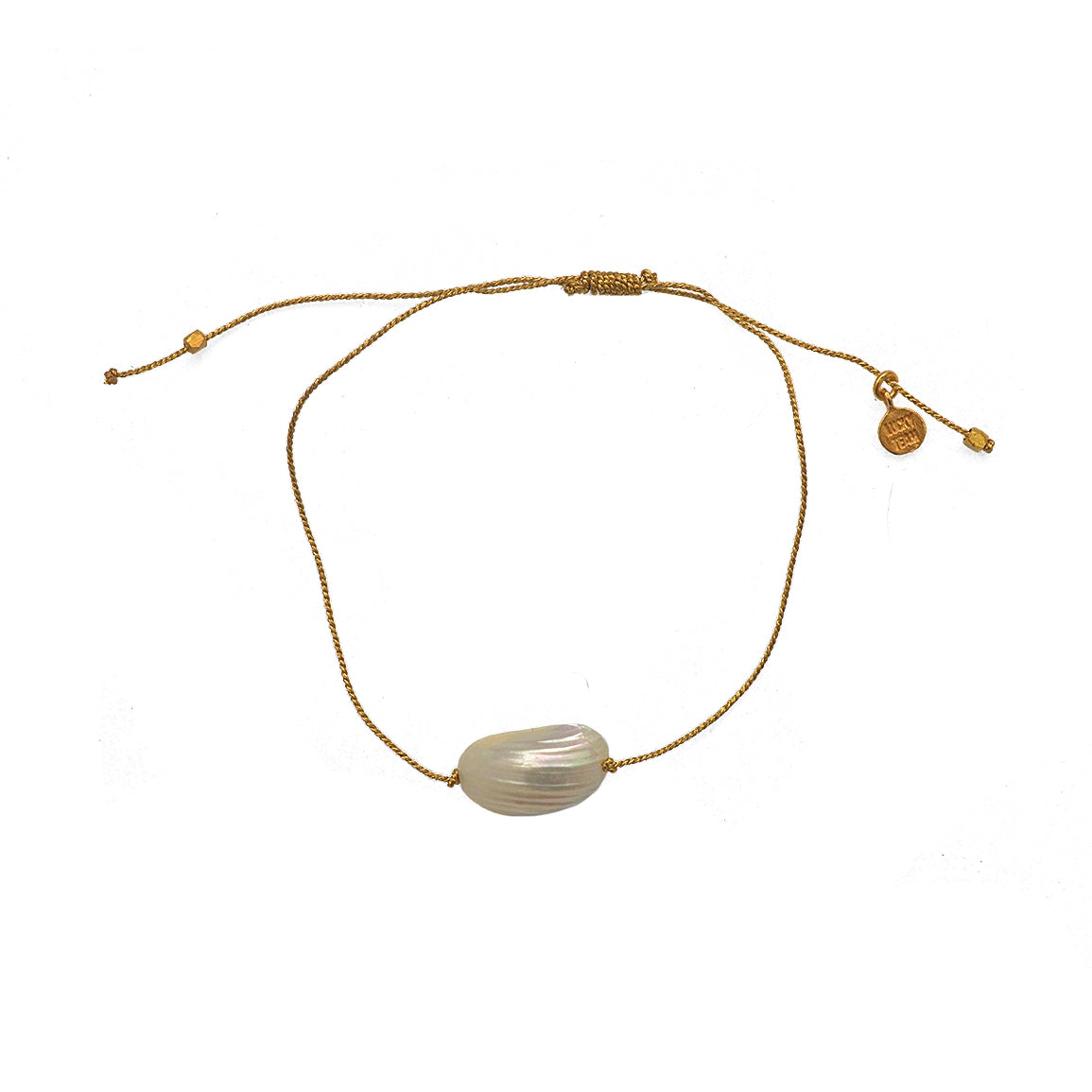 Bracelet tressé doré et coquillage