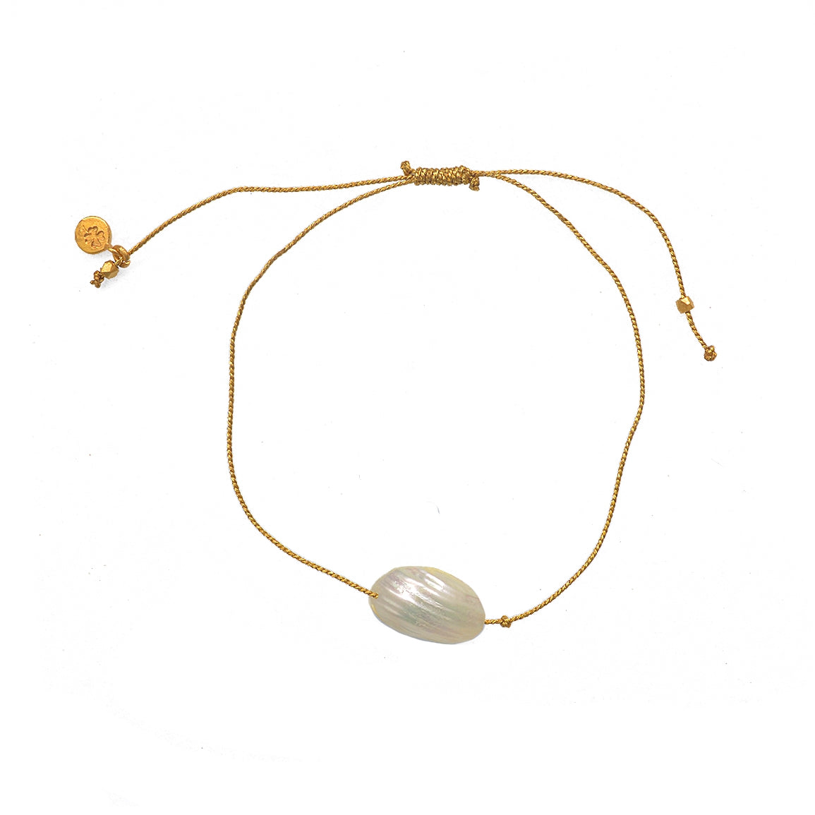 Bracelet tressé doré et coquillage
