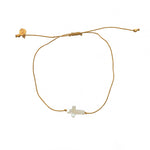 Bracelet doré et croix nacre