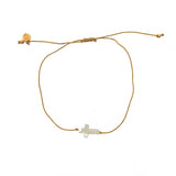 Bracelet doré et croix nacre