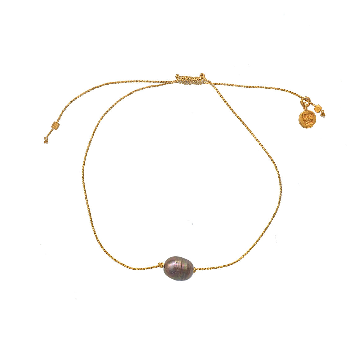 Bracelet doré et perle de culture grise
