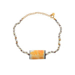 Bracelet de cheville doré et coquillages