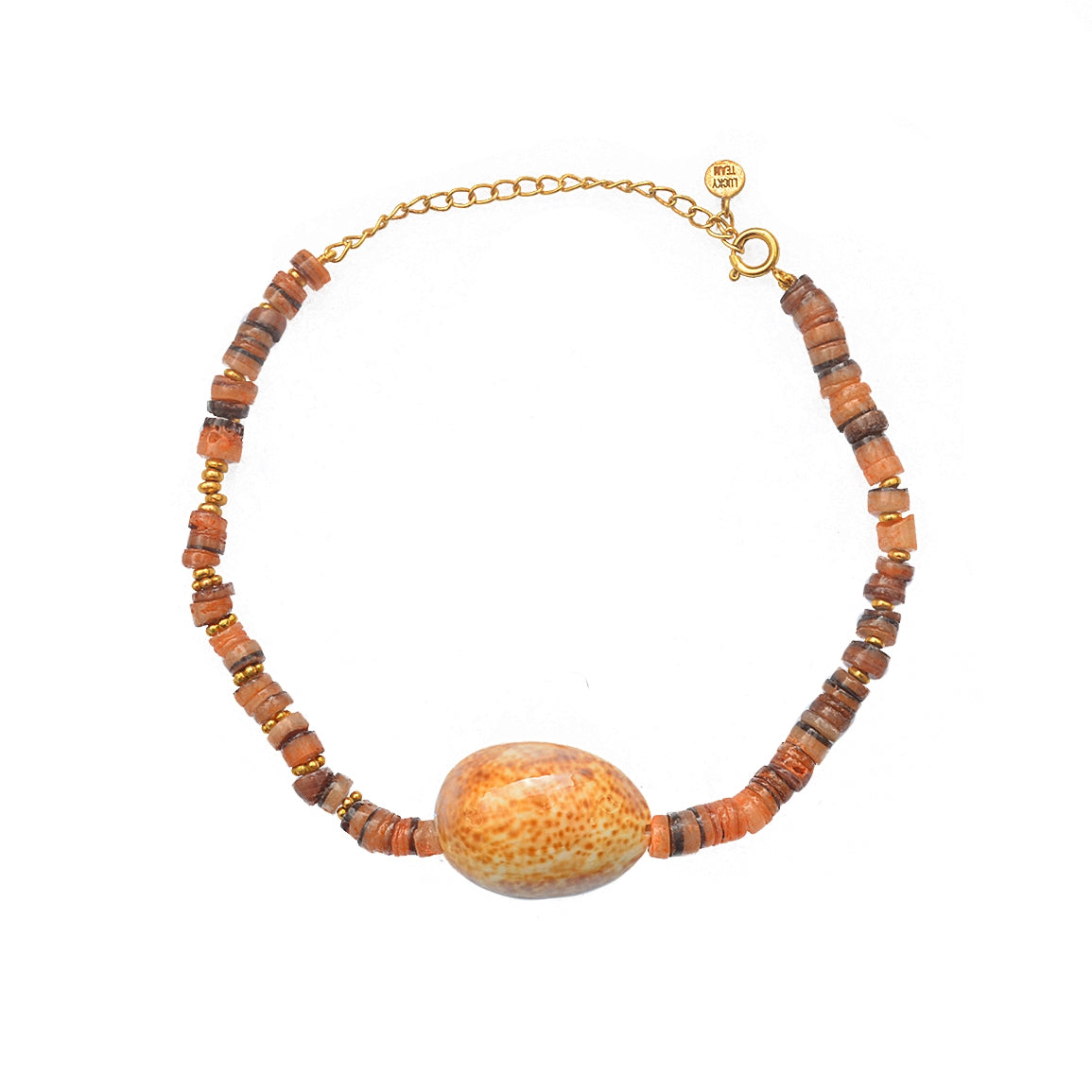Bracelet de cheville doré et coquillage